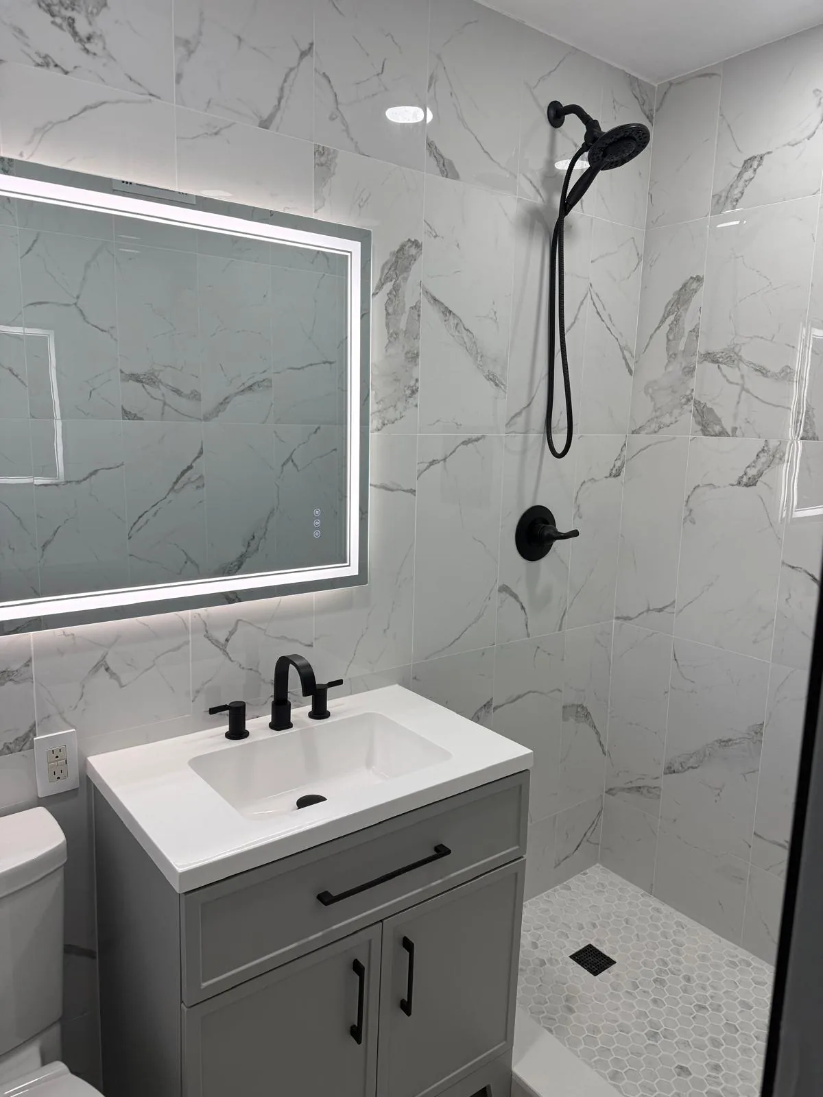 Renovated bathroom adding resale value to a Miami FL home by Primer Star Corp