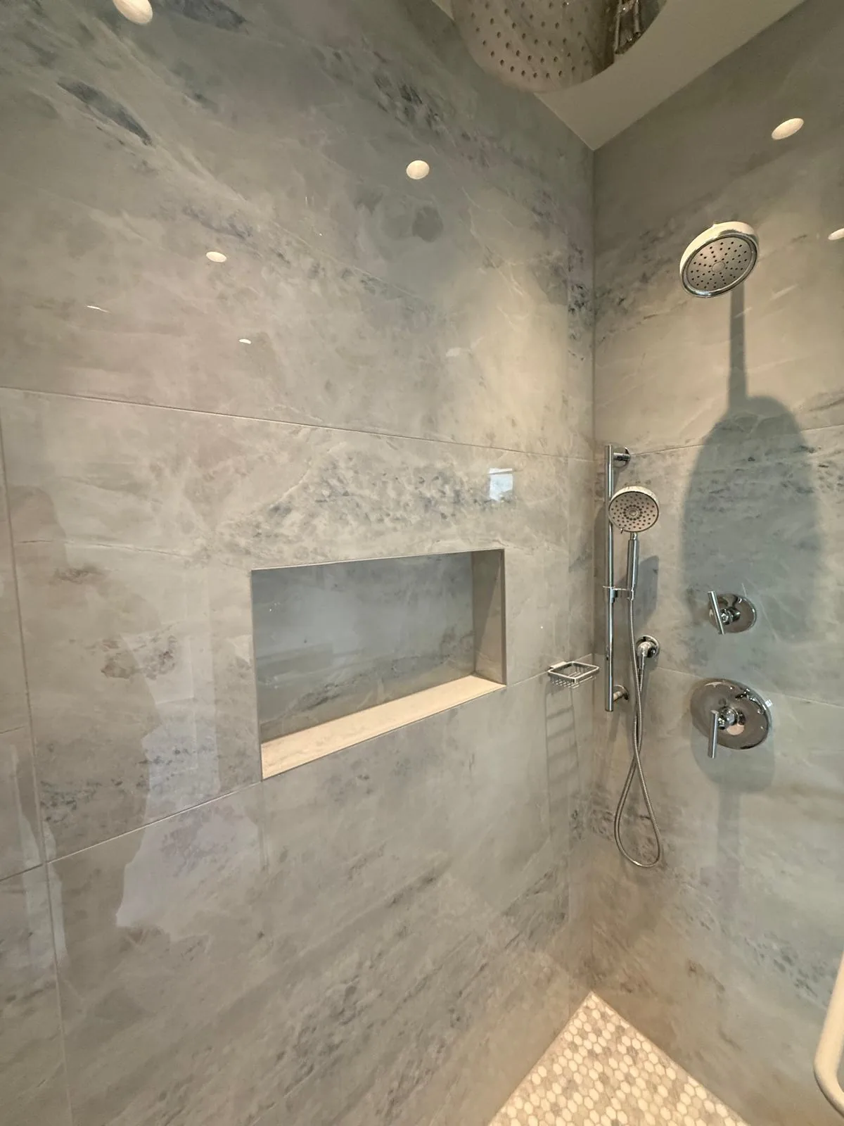 Marble walk-in shower with built-in bench — Pompano Beach, FL
