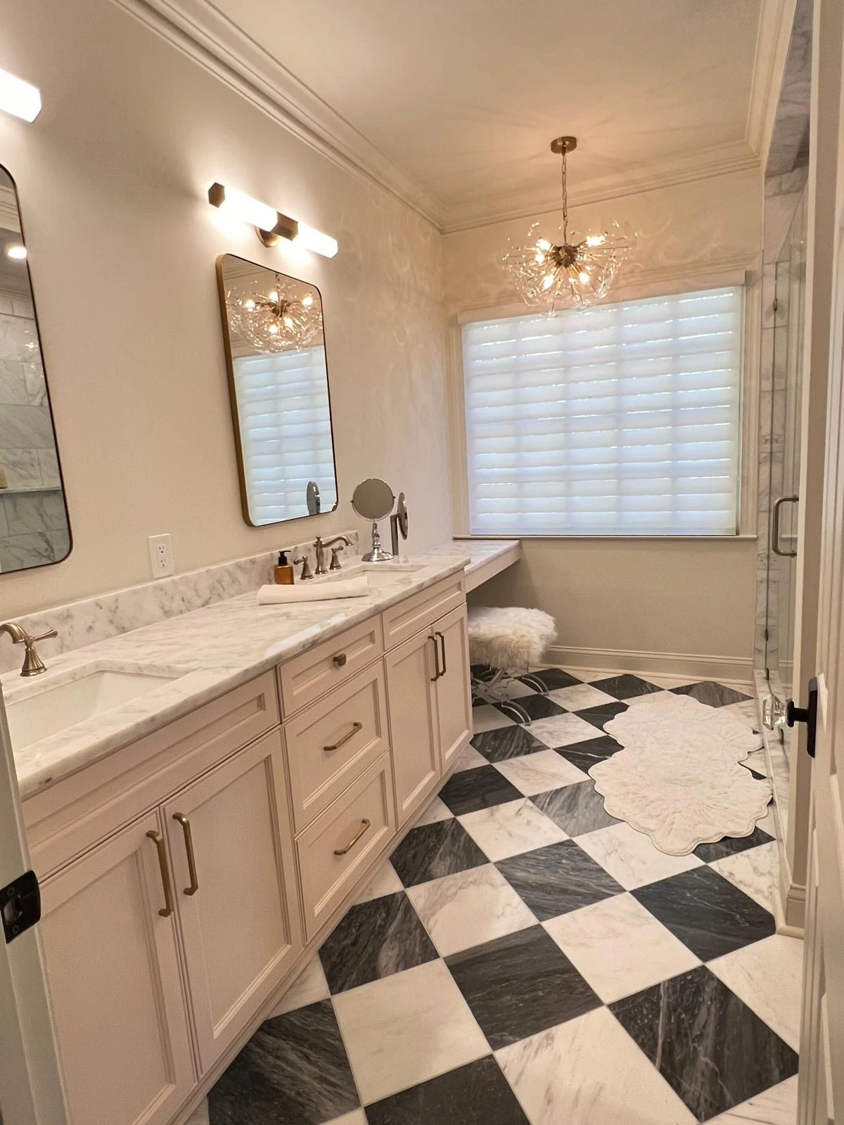 Master bathroom with double vanity, soaking tub and checkered marble floor — Hollywood, FL