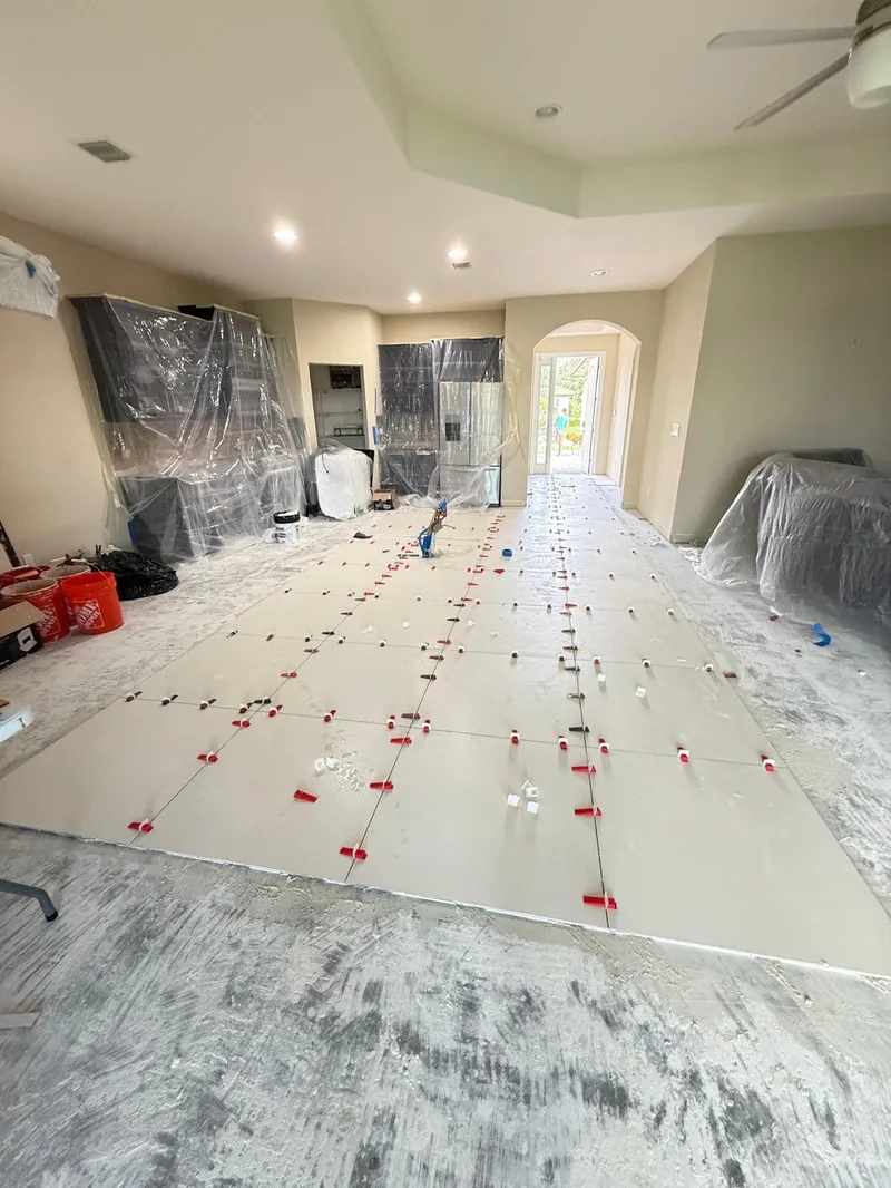 Large-format tile flooring installation in a Miami FL home by Primer Star Corp