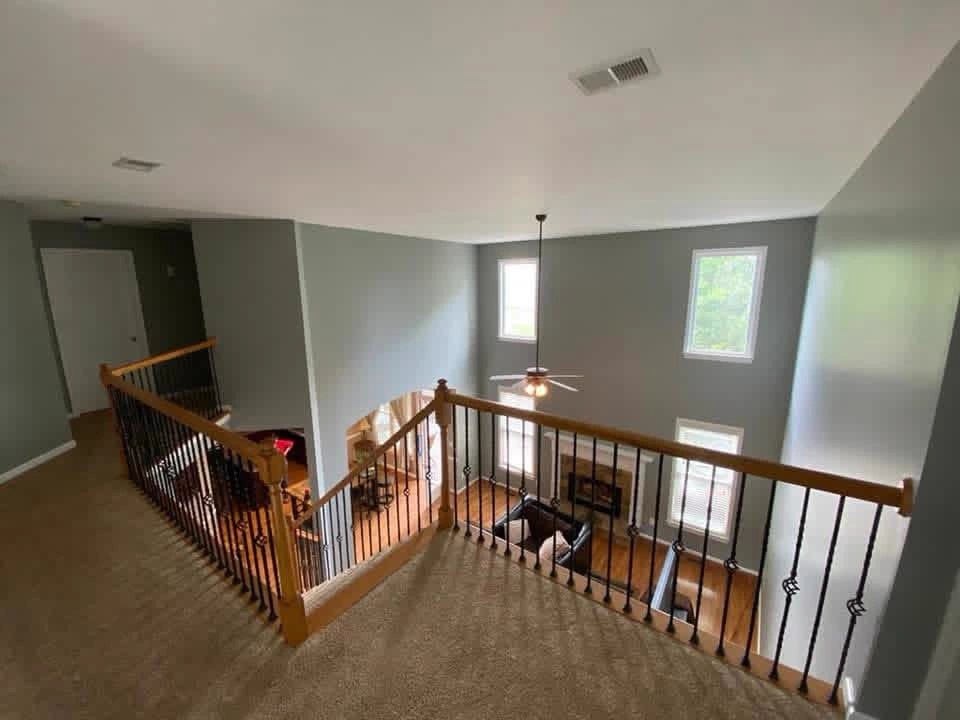Second floor view of interior painting with gray walls in Weston FL by Primer Star Corp