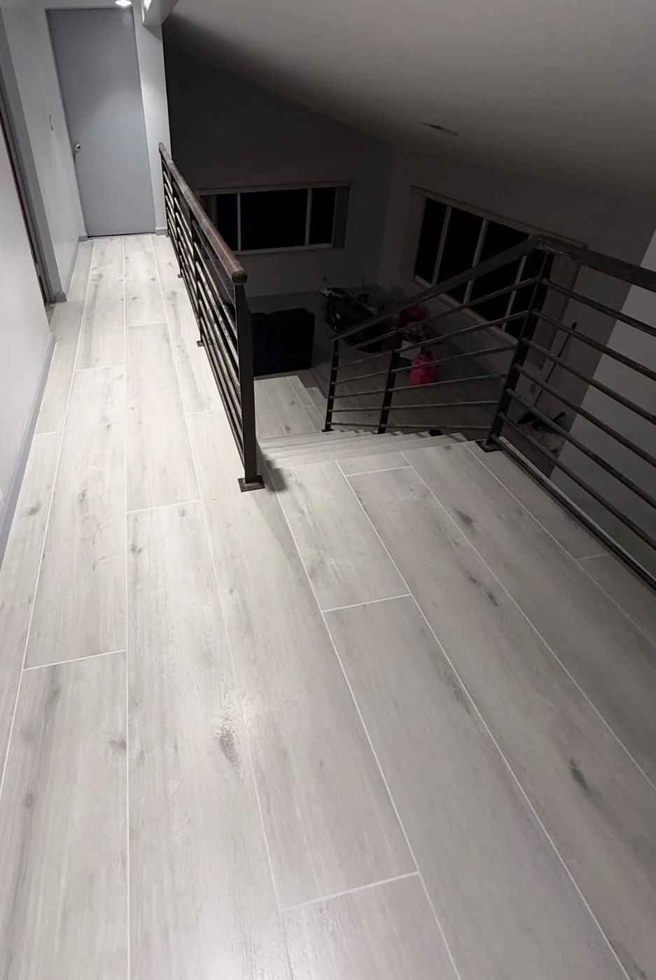 Wide-plank vinyl flooring installation in a residential home